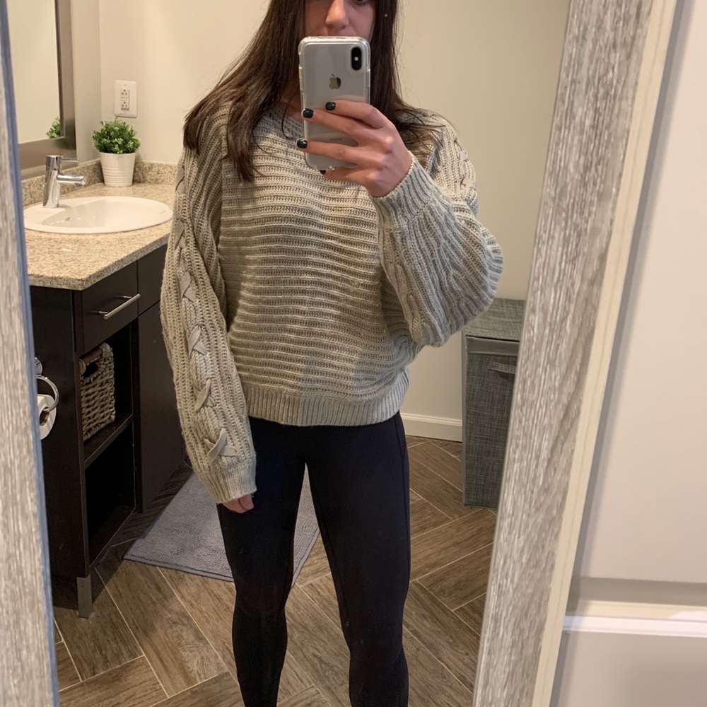 Tan sweater with lace up sleeve